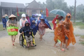 Quảng Trị diễn tập phòng chống thiên tai hướng đến người khuyết tật. (Ảnh: TTXVN)