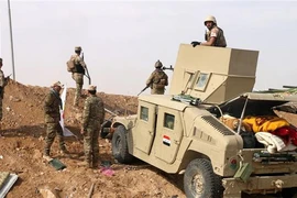 Binh sỹ Iraq gác tại khu vực biên giới giữa Iraq và Syria. (Nguồn: AFP/TTXVN)