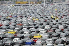 Xe ôtô mới tại công ty liên doanh Ford Mazda ở thành phố Trùng Khánh, Trung Quốc. (Nguồn: AFP/TTXVN)