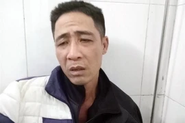 Đối tượng Vũ Văn Thiện tại cơ quan điều tra. (Ảnh: Văn Đạt/TTXVN)