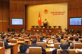 Quốc hội biểu quyết thông qua Luật Phòng, chống tham nhũng (sửa đổi) với tỷ lệ tán thành 93,20%. (Ảnh: Phương Hoa/TTXVN)