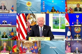 Ngày 26/10/2021, Tổng thống Mỹ Joe Biden (ảnh, giữa) tham dự Hội nghị cấp cao ASEAN-Mỹ lần thứ 9 theo hình thức trực tuyến (Ảnh: AFP/TTXVN)