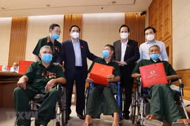 Thủ tướng Phạm Minh Chính gặp mặt, tri ân đại biểu Người có công với cách mạng. (Ảnh: Dương Giang/TTXVN) 