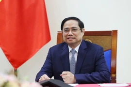 Thủ tướng Phạm Minh Chính điện đàm với ông John Kerry, Đặc phái viên của Tổng thống Hoa Kỳ. (Ảnh: Dương Giang/TTXVN)