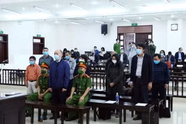 Các bị cáo tại phiên tòa. (Ảnh: Phạm Kiên/TTXVN)
