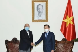 Phó Thủ tướng Lê Minh Khái tiếp Bộ trưởng Bộ Dầu mỏ Kuwait Mohammad Abdullateef M A Alfares. (Ảnh: TTXVN phát)