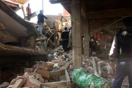 Một tòa nhà bị sập trong trận động đất ở Imphal, Ấn Độ ngày 4/1. (Ảnh: AFP/TTXVN)