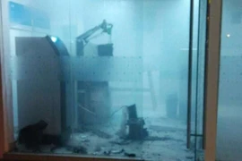 Cây ATM bị phá tung để lấy tiền. (Nguồn: The Star)