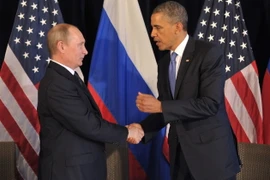 Tổng thống Nga Vladimir Putin và người đồng cấp Mỹ Barack Obama. (Nguồn: Reuters)