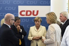 Thủ tướng Đức Angela Merkel (giữa) tại cuộc họp với các thành viên của Đảng CDU. (Nguồn: AFP/TTXVN)