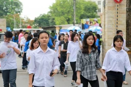 Thí sinh tham dự kỳ thi trung học phổ thông quốc gia năm 2016. (Ảnh: Lê Minh Sơn/Vietnam+)