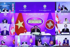 Bộ trưởng Bộ Ngoại giao Bùi Thanh Sơn phát biểu tại điểm cầu trực tuyến Hà Nội. (Ảnh: Phạm Kiên/TTXVN)