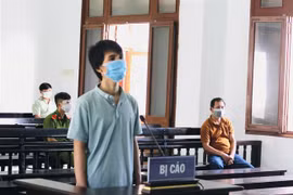 Ngô Công Trứ nghe tòa tuyên án. (Ảnh: TTXVN)