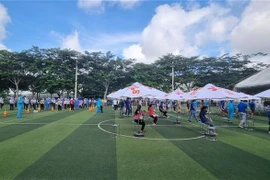 Tổ chức tiêm vaccine miễn phí 100% cho hơn 5.500 công nhân tại Khu công nghiệp Việt Nam-Singaore. (Ảnh: Chí Tưởng/TTXVN)