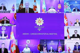 Bộ trưởng Ngoại giao các nước tham dự Hội nghị Bộ trưởng Ngoại giao ASEAN-Canada theo hình thức trực tuyến. (Ảnh: Phạm Kiên/TTXVN)