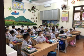 Học sinh lớp 1 Trường Tiểu học Minh Khai, thành phố Hà Giang. (Ảnh: Nguyễn Chiến/TTXVN)