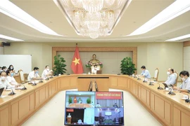 Quang cảnh buổi làm việc. (Ảnh: Minh Đức/TTXVN)