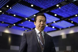 Chủ tịch Interpol Mạnh Hoành Vĩ tới dự Đại hội thế giới Interpol ở Singapore ngày 4/7/2017. (Nguồn: AP/ TTXVN)