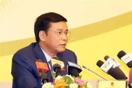 Tổng Thư ký, Chủ nhiệm Văn phòng Quốc hội Nguyễn Hạnh Phúc chủ trì buổi họp báo. (Ảnh: Trọng Đức/TXVN)