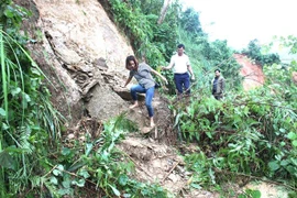 Tuyến đường trung tâm xã Bản Rịa đi các thôn, bản. (Ảnh: Mộc Lan/TTXVN phát)