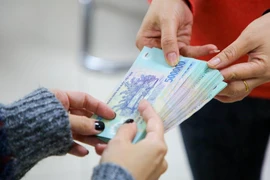 Thưởng Tết Dương lịch năm 2021 tăng kỷ lục so với các năm trước. (Ảnh minh họa: PV/Vietnam+)