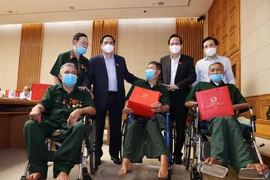 Thủ tướng Phạm Minh Chính gặp mặt, tri ân đại biểu Người có công với cách mạng. (Ảnh: Dương Giang/TTXVN) 