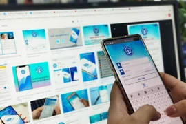 Truy cập ứng dụng Bảo hiểm xã hội số. (Ảnh: PV/Vietnam+)