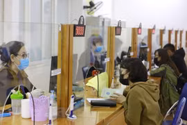 Lao động làm hồ sơ hưởng bảo hiểm thất nghiệp. (Ảnh minh hoạ: PV/Vietnam+)