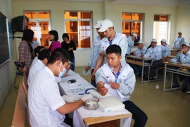 Lao động Việt Nam kiểm tra sức khỏe trước khi sang Hàn Quốc làm việc (Ảnh minh hoạ: PV/Vietnam+)