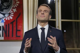 Tổng thống Pháp Emmanuel Macron phát biểu tại Paris, Pháp, ngày 31/12/2018. (Ảnh: AFP/TTXVN)