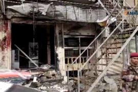 Hiện trường vụ tấn công liều chết tại Manbij , miền Bắc Syria, ngày 16/1. (Ảnh: AFP/TTXVN)