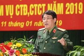 Chủ nhiệm Tổng cục Chính trị Quân đội Nhân dân Việt Nam Lương Cường phát biểu tại hội nghị. (Ảnh: Dương Giang/TTXVN)