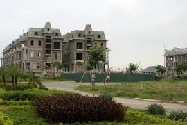 Trên cả nước mới cấp được 4,2 triệu sổ đỏ cho đất đô thị. (Nguồn: Hoàng Lâm/TTXVN)