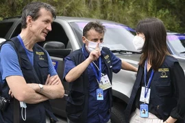 Các thành viên trong nhóm quan sát viên của EU tới Caracas, Venezuela. (Ảnh: AFP/TTXVN)