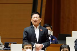 Bộ trưởng Bộ Tài chính Hồ Đức Phớc giải trình ý kiến của đại biểu Quốc hội. (Ảnh: Phương Hoa/TTXVN)