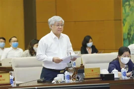 Chủ tịch Ủy ban Trung ương Mặt trận Tổ quốc Việt Nam Đỗ Văn Chiến trình bày báo cáo (tóm tắt). (Ảnh: Doãn Tấn/TTXVN)