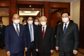 Tổng Bí thư Nguyễn Phú Trọng, Chủ tịch nước Nguyễn Xuân Phúc, Thủ tướng Phạm Minh Chính và Chủ tịch Quốc hội Vương Đình Huệ dự Hội nghị. (Ảnh: Trí Dũng/TTXVN)