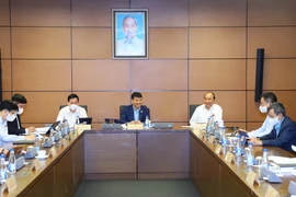 Quang cảnh các đoàn đại biểu Quốc hội thảo luận ở tổ. (Ảnh: Văn Điệp/TTXVN)