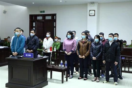 Các bị cáo tại phiên tòa phúc thẩm. (Ảnh: Phạm Kiên/TTXVN)