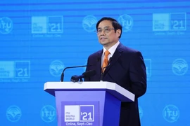 Thủ tướng Phạm Minh Chính phát biểu tại Triển lãm Thế giới số năm 2021. (Ảnh: Dương Giang/TTXVN)