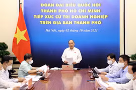 Chủ tịch nước Nguyễn Xuân Phúc phát biểu tại điểm cầu Hà Nội. (Ảnh: Thống Nhất/TTXVN)