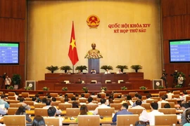 Quốc hội biểu quyết thông qua Nghị quyết xác nhận kết quả lấy phiếu tín nhiệm đối với 48 chức danh được Quốc hội bầu hoặc phê chuẩn với 100% đại biểu đồng ý (464/464). (Ảnh: Thống Nhất/TTXVN)