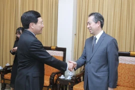 Phó Thủ tướng, Bộ trưởng Ngoại giao Phạm Bình Minh tiếp Đại sứ Trung Quốc tại Việt Nam Hùng Ba. (Ảnh: Lâm Khánh/TTXVN)