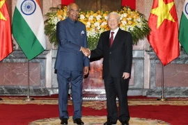 Tổng Bí thư, Chủ tịch nước Nguyễn Phú Trọng chụp ảnh chung với Tổng thống Ấn Độ Ram Nath Kovind. (Ảnh: Trí Dũng/TTXVN)