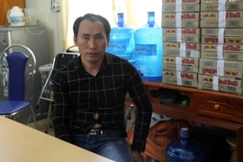 Đối tượng Vàng A Minh, sinh năm 1978, bản Pú Hồng B, xã Pú Hồng, huyện Điện Biên Đông, tỉnh Điện Biên tại cơ quan công an. (Ảnh: Bùi Hiếu/TTXVN)