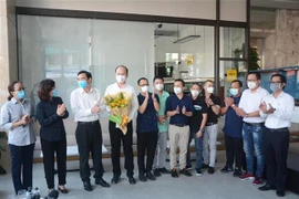 Lãnh đạo thành phố Đà Nẵng gặp mặt thân mật, tiễn đoàn y, bác sỹ Thành phố Hồ Chí Minh. (Ảnh: Văn Dũng/TTXVN)