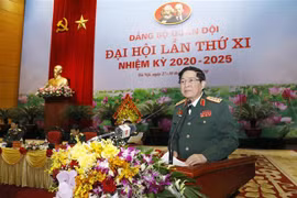 Đại tướng Ngô Xuân Lịch, Ủy viên Bộ Chính trị, Phó Bí thư Quân ủy Trung ương, Bộ trưởng Bộ Quốc phòng phát biểu bế mạc Đại hội đại biểu Đảng bộ Quân đội lần thứ XI. (Ảnh: Dương Giang/TTXVN)