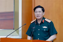 Đại tướng Ngô Xuân Lịch, Ủy viên Bộ Chính trị, Phó Bí thư Quân uỷ Trung ương, Bộ trưởng Bộ Quốc phòng, phát biểu khai mạc hội nghị. (Ảnh: Dương Giang/TTXVN)
