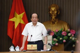 Bộ trưởng, Chủ nhiệm Văn phòng Chính phủ Mai Tiến Dũng chủ trì cuộc họp. (Ảnh: Dương Giang/TTXVN)