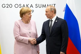 Tổng thống Nga Vladimir Putin gặp Thủ tướng Đức Angela Merkel bên lề Hội nghị thượng đỉnh G-20 ở Osaka, Nhật Bản, tháng 6/2019. (Nguồn: Reuters)